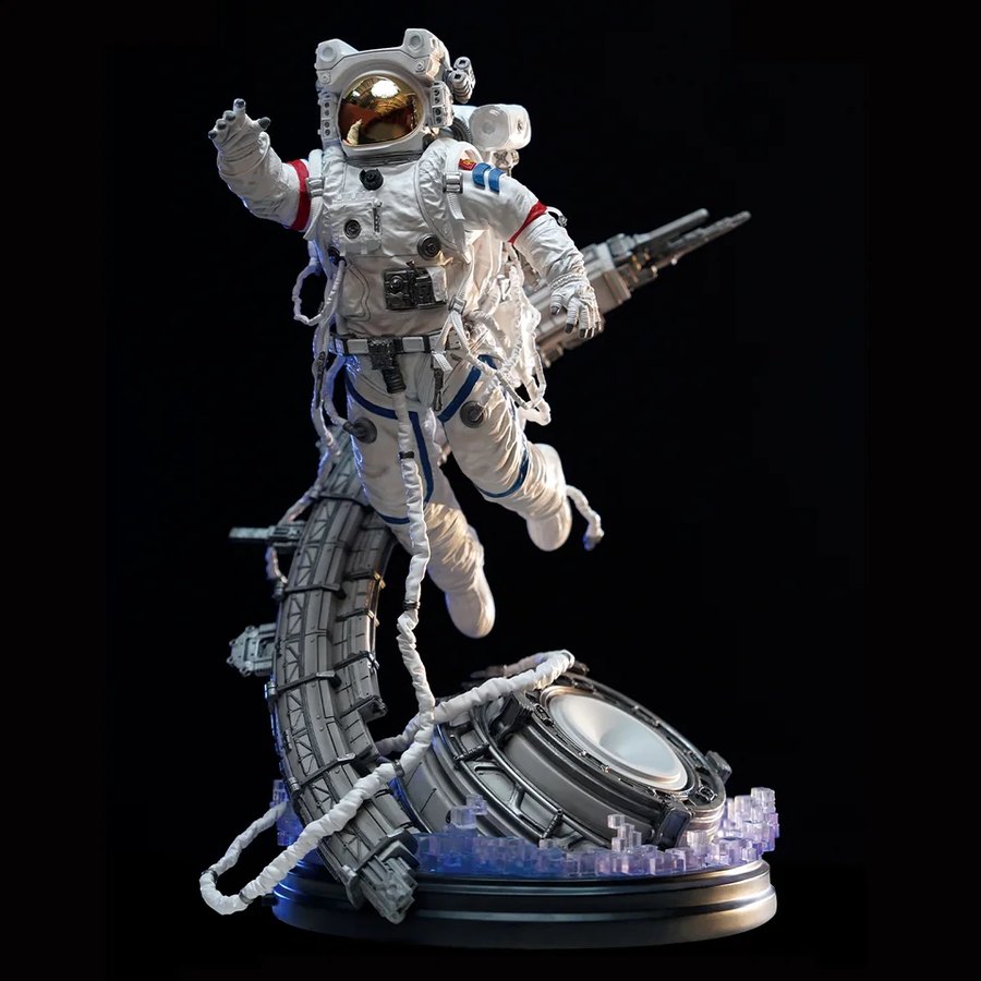 Licensed collectible figure in hand-painted polystone, with a multi-part industrial display base
